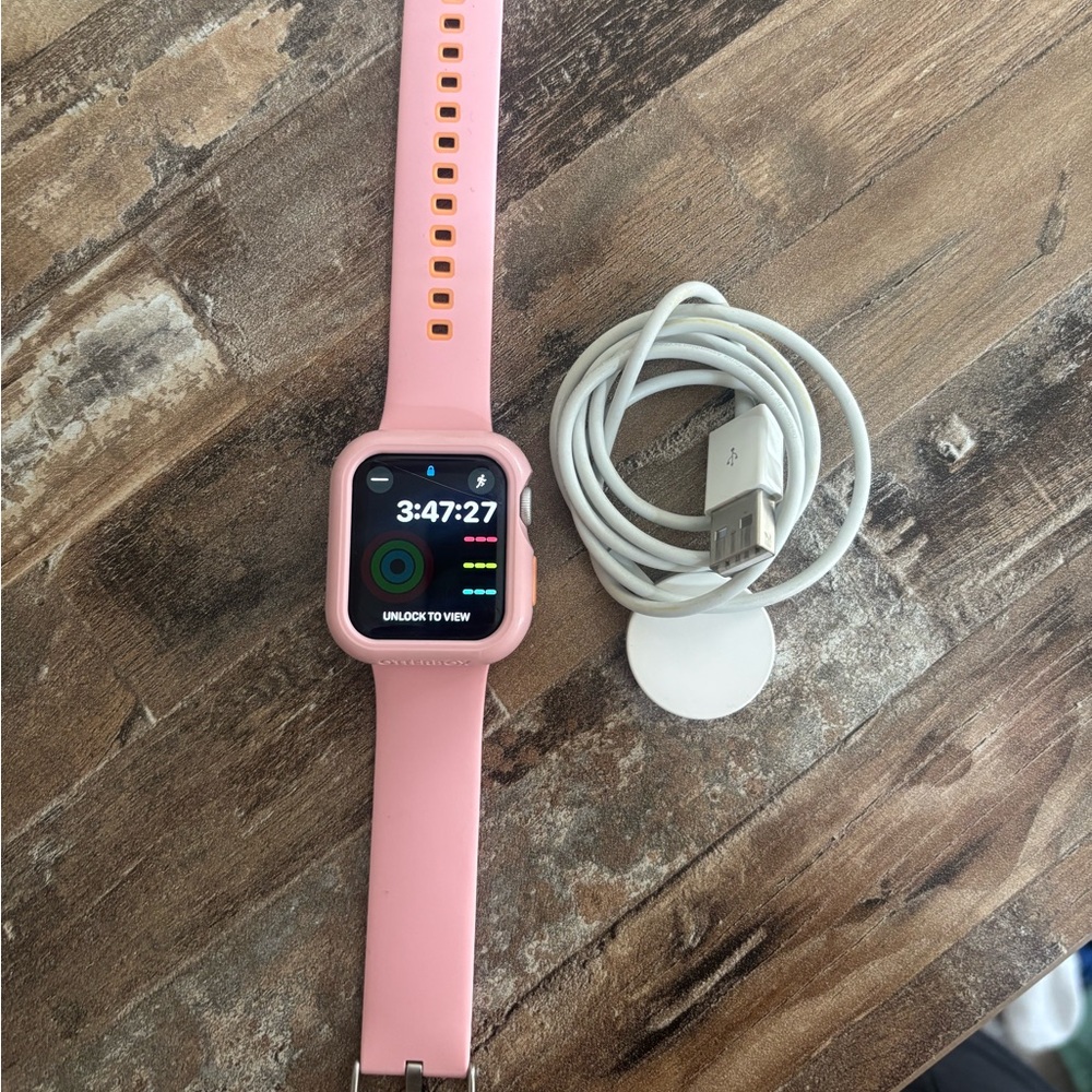 Apple Watch SE with charger & Otterbox case/band